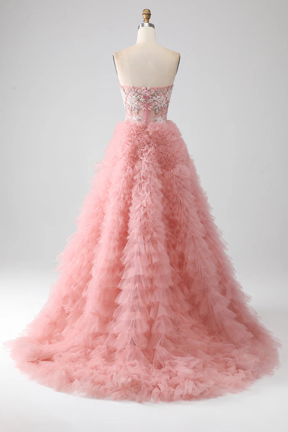 Back view of the A-Line strapless beaded tiered blush long prom dress.