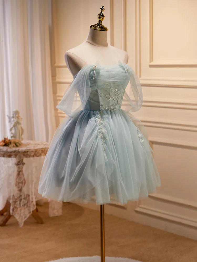 Back view of the light green tulle short formal dress.