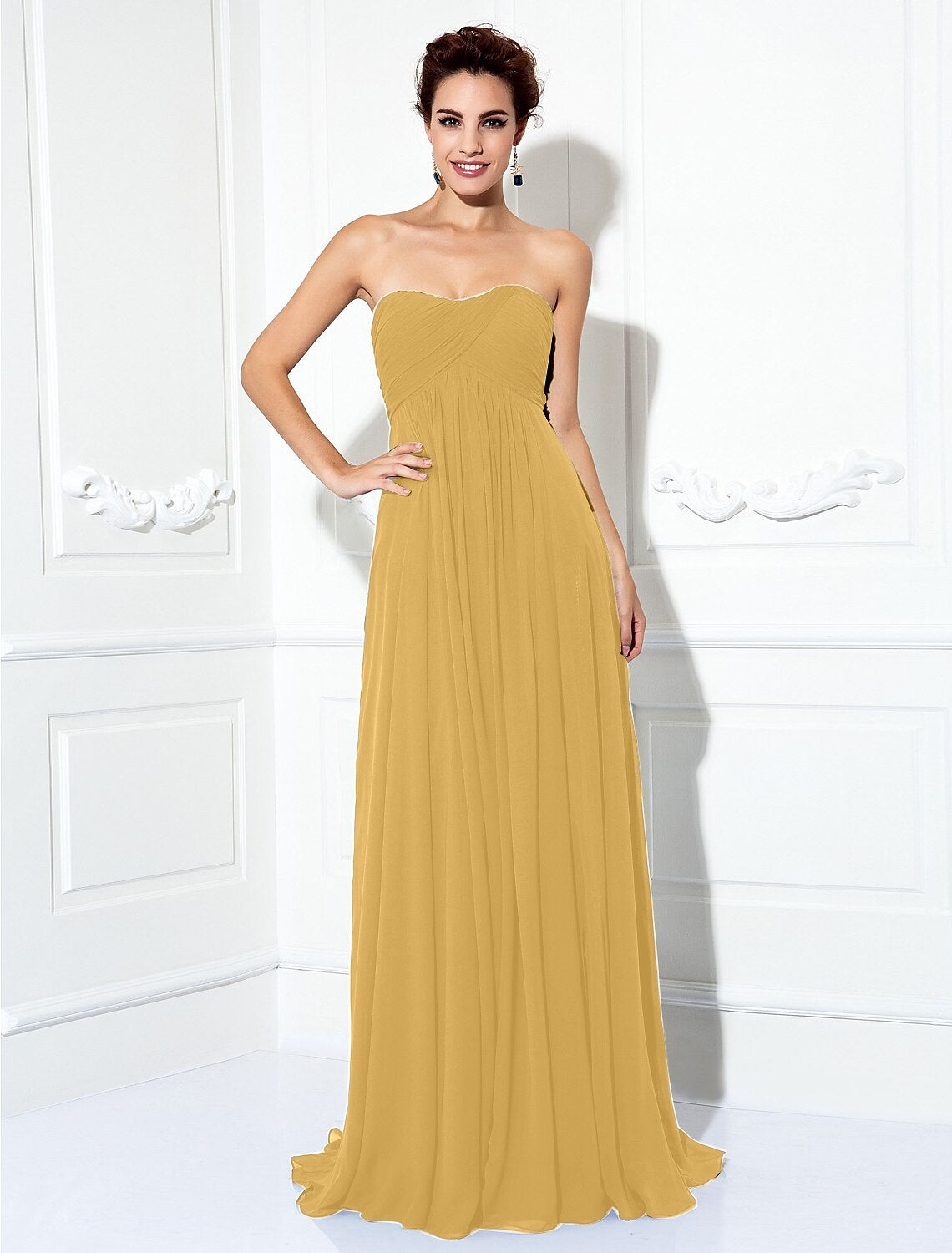 Back view of a flowing A-line strapless formal dress.