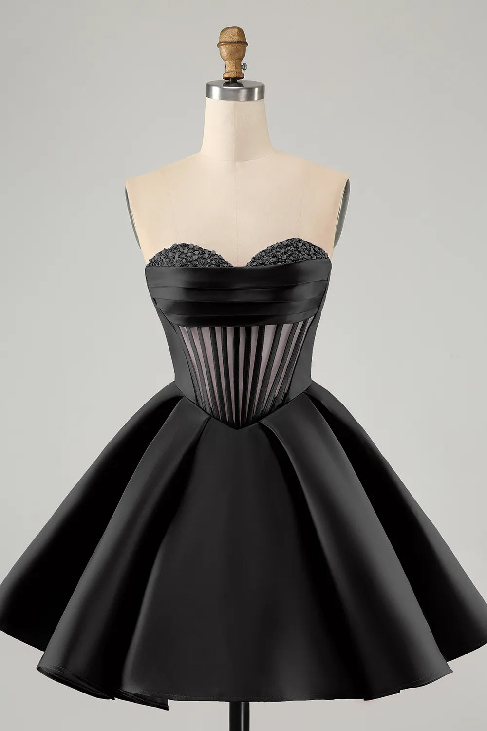 Black A-line strapless satin corset short homecoming dress with beading.