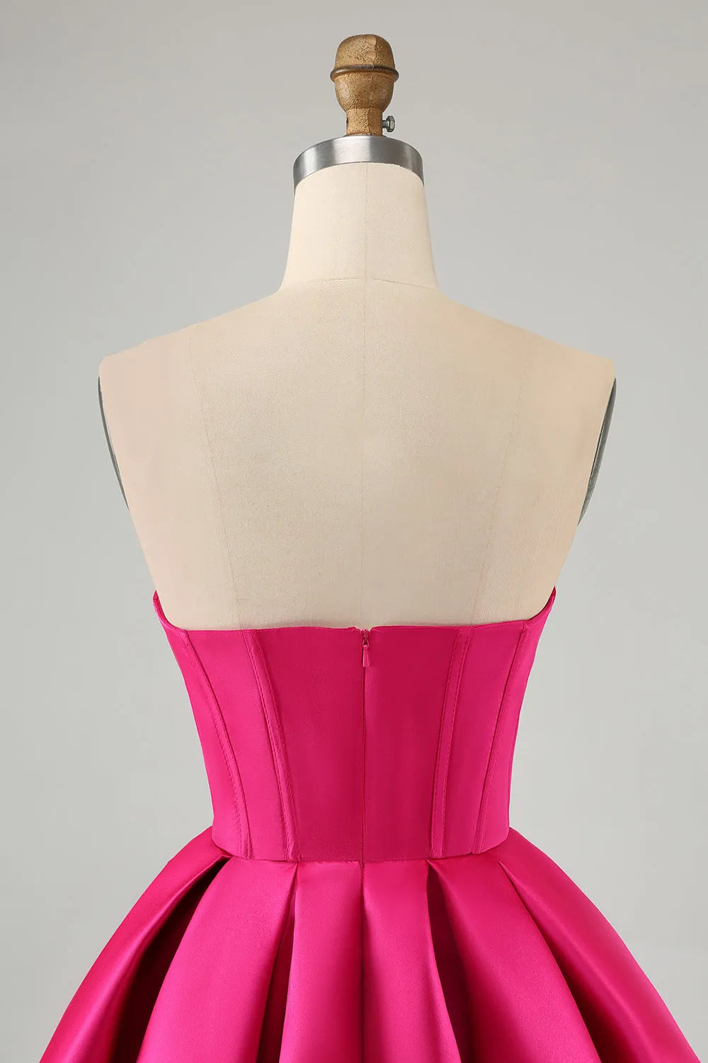 Fuchsia A-line strapless satin corset short homecoming dress, side view.