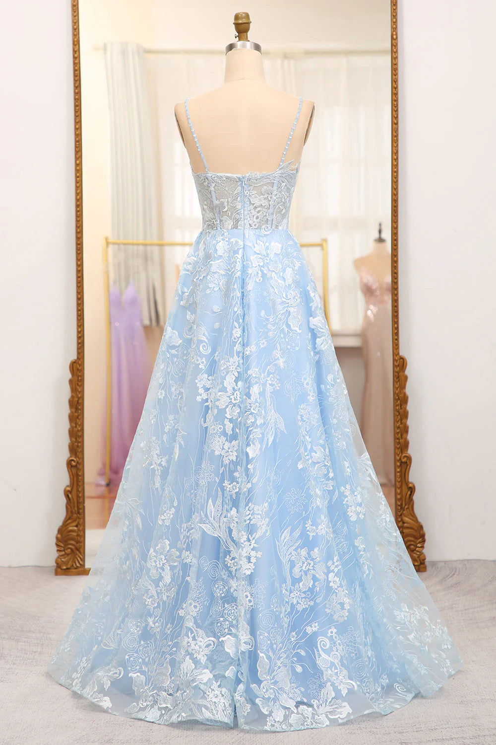 Back view of the sky blue prom dress, showing the elegant corset lacing.