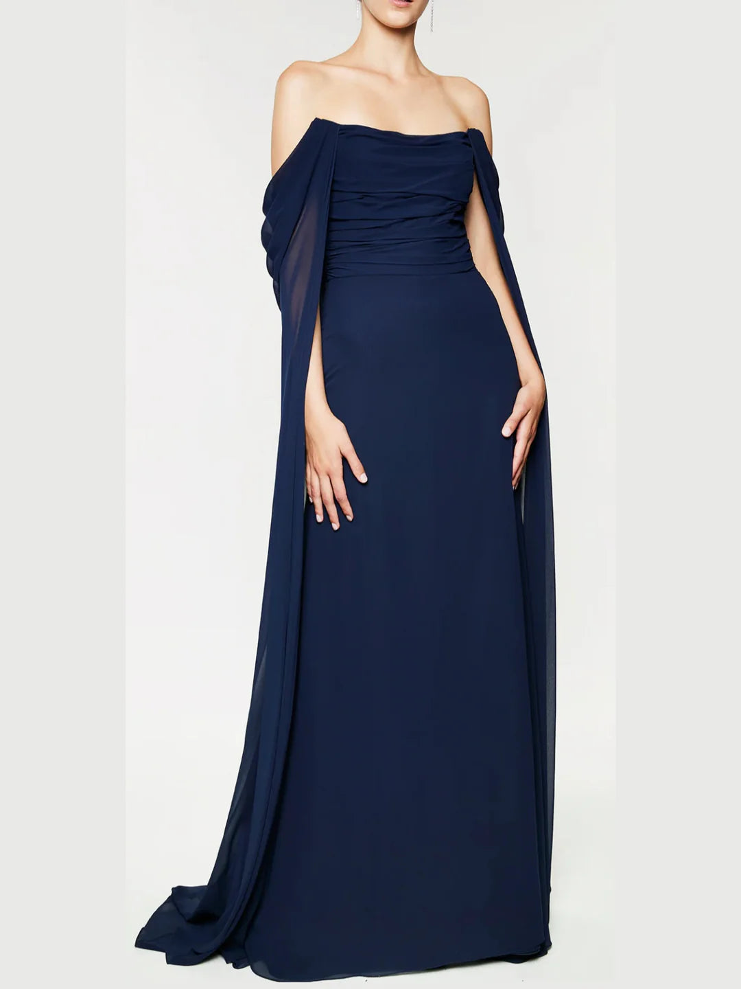 Model wearing a sophisticated navy A-line strapless gown.