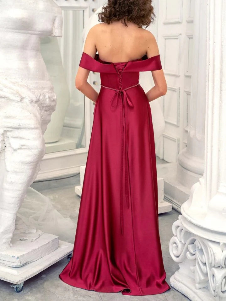 Full view of the A-line strapless formal dress.