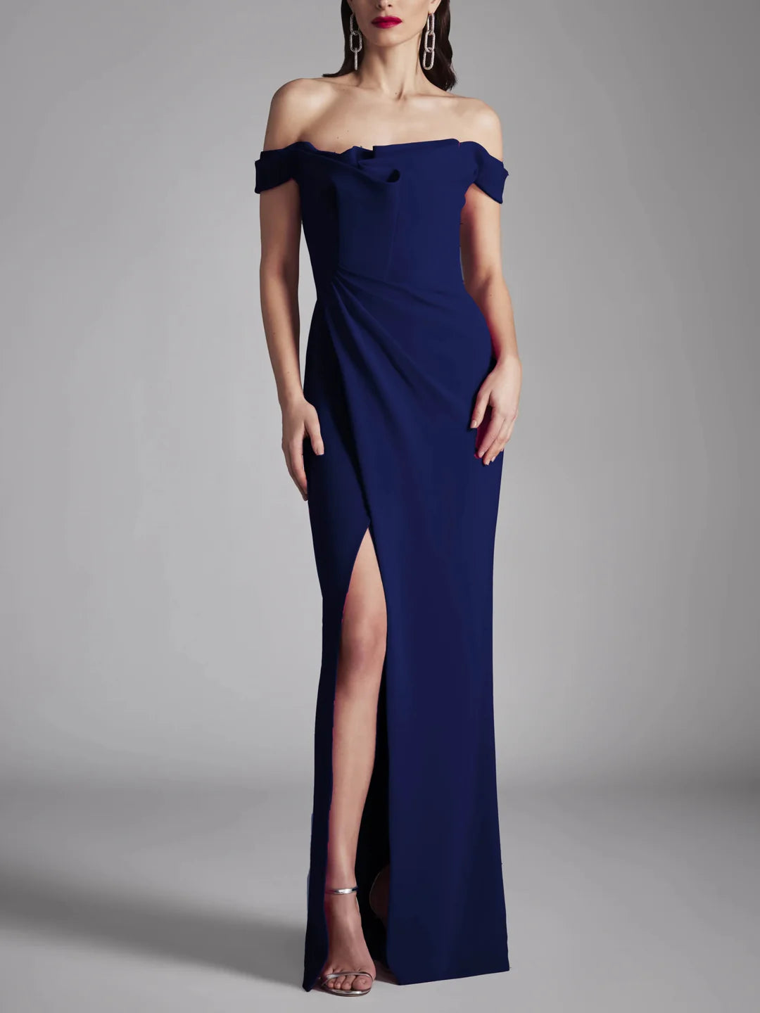Navy blue A-Line strapless evening dress with a flowing skirt.