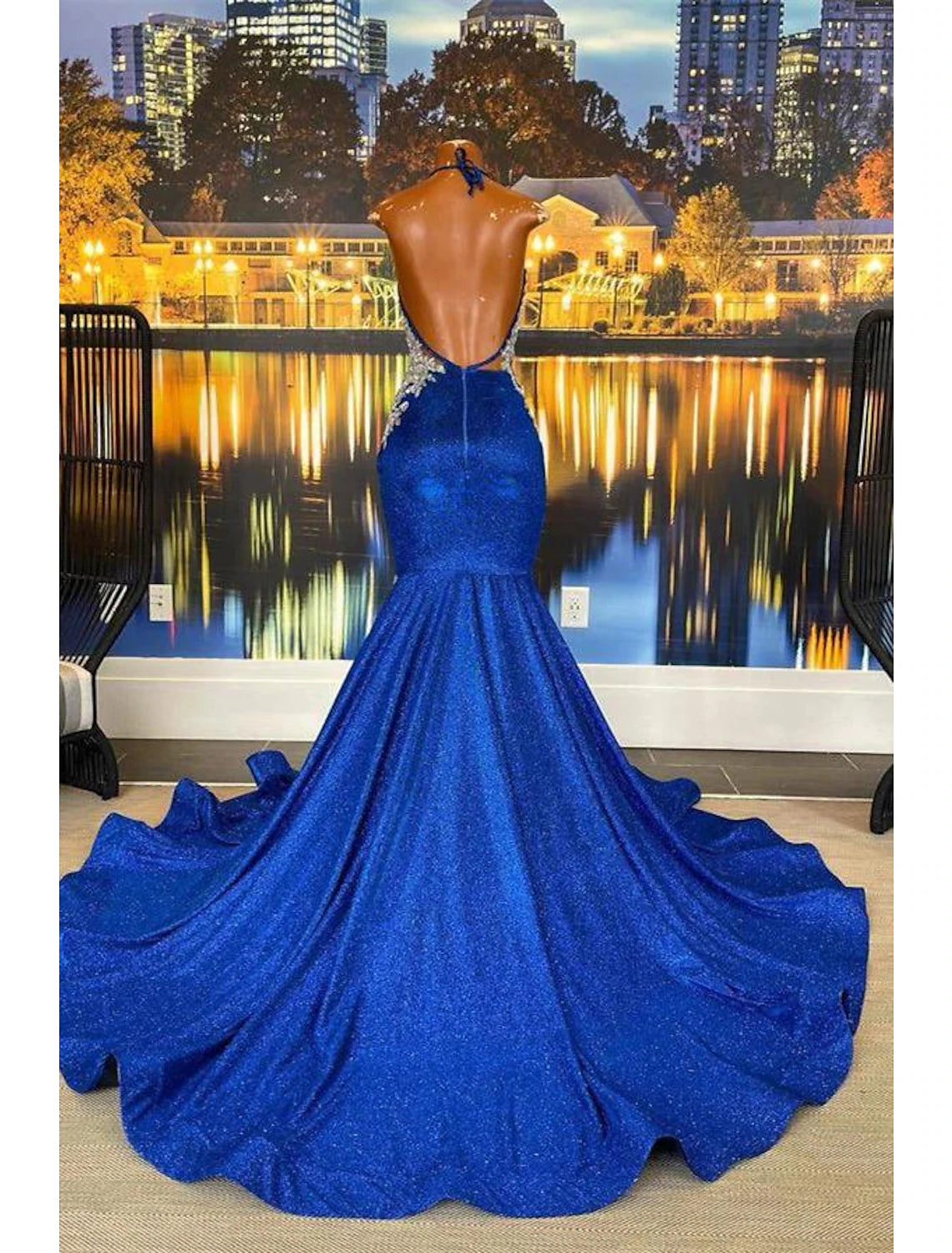 Back view of A-Line strapless prom dress showing lace-up detail.