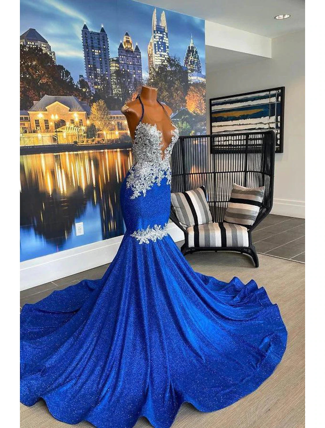 Side view of A-Line strapless floral lace gown.