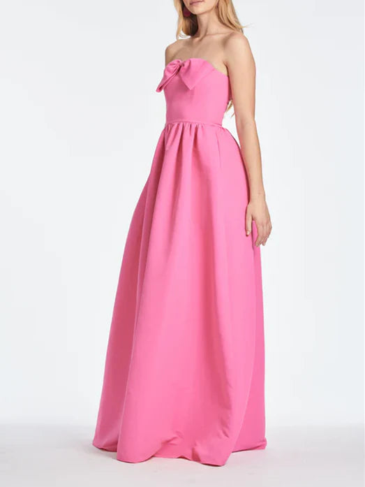 Detail of the floor length formal dress.