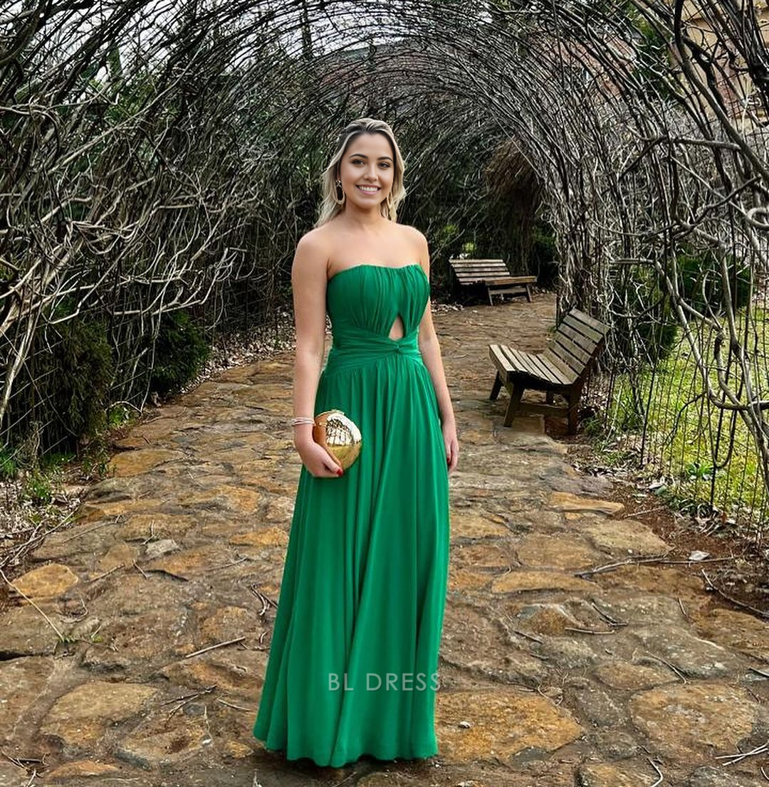 Back view of an elegant green A-line strapless long formal dress.