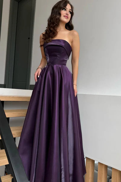 Elegant purple A-line prom dress with strapless neckline.