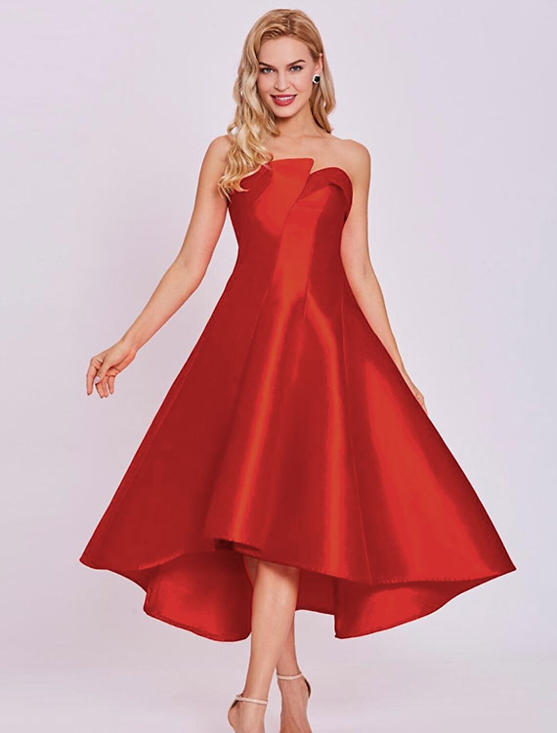 Elegant A-line strapless satin cocktail dress on a model.