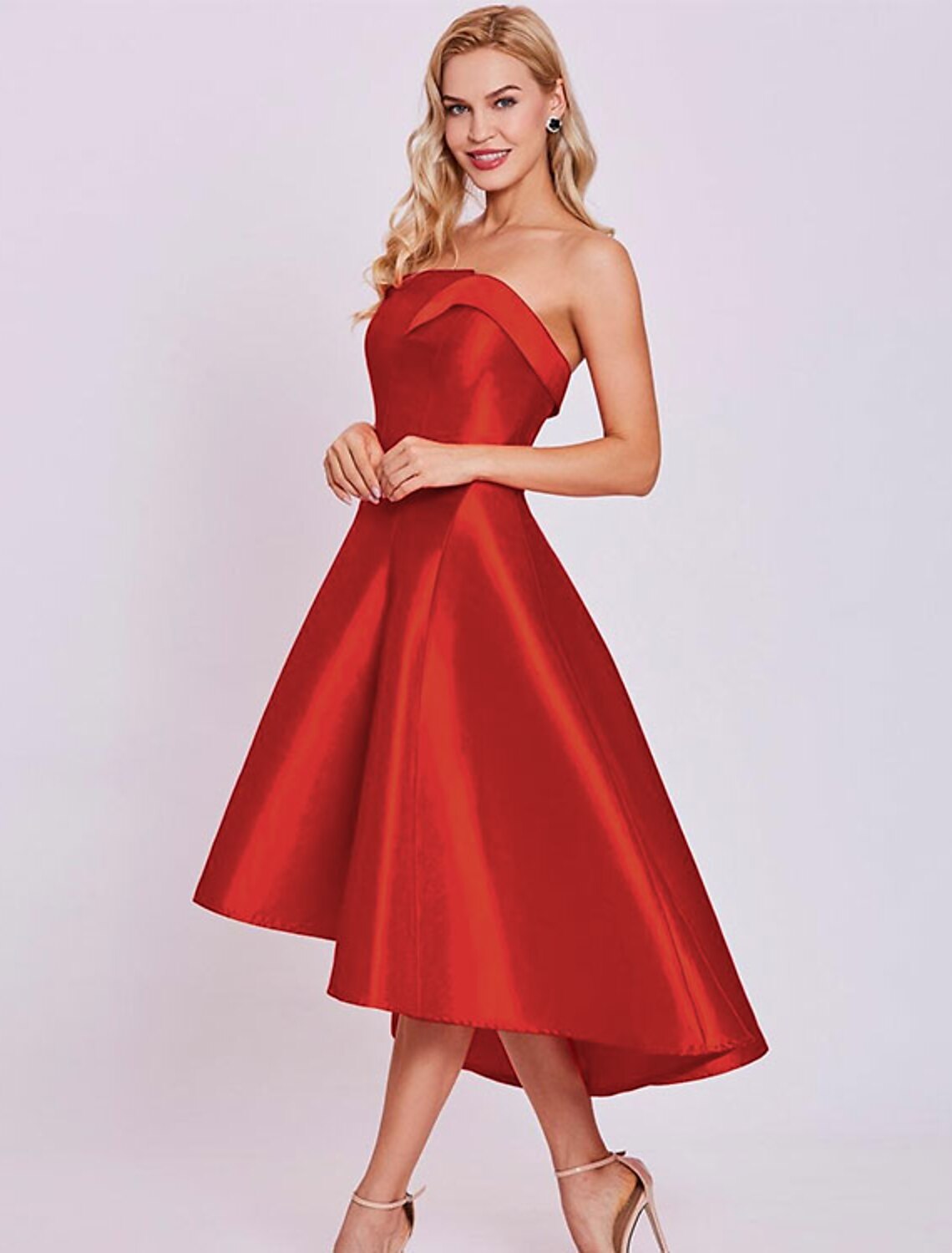 Full length view of the elegant satin cocktail dress.