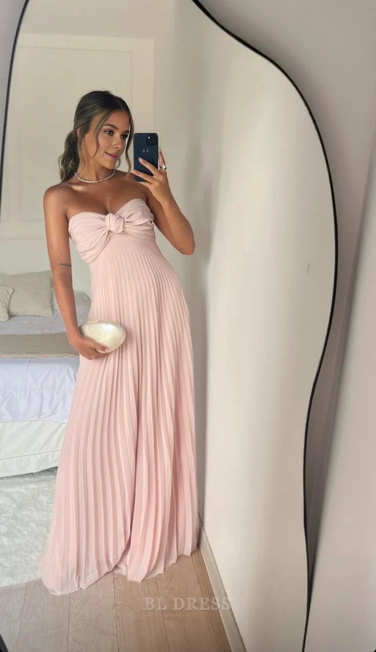 Elegant pink A-line strapless pleated long formal gown.