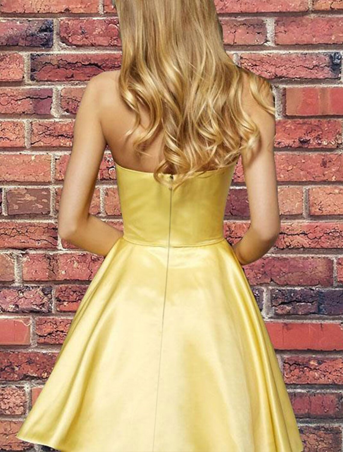 Back view of a chic A-line strapless satin cocktail dress.