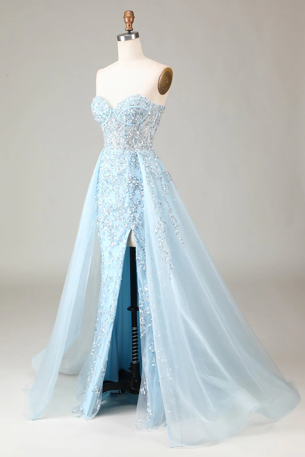 Elegant light blue prom dress with a flowing A-line skirt.