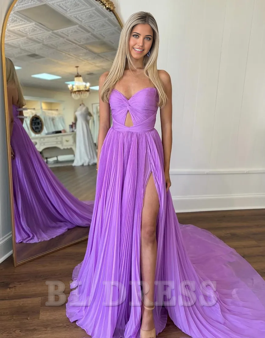 Back view of a purple A-line strapless evening gown with a flowing skirt.