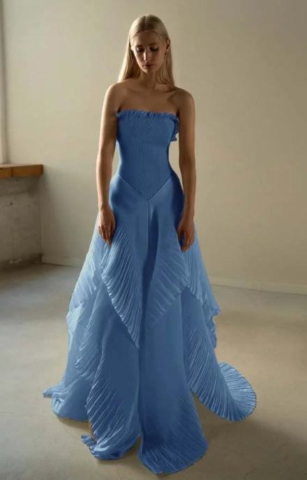 Back view of the elegant long prom dress, showcasing pleats.