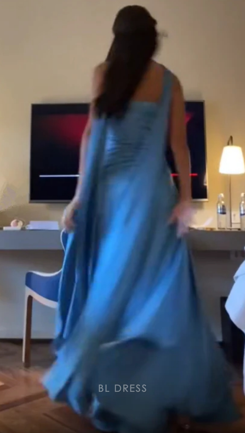 Full length view of a blue A-line strapless satin prom dress.