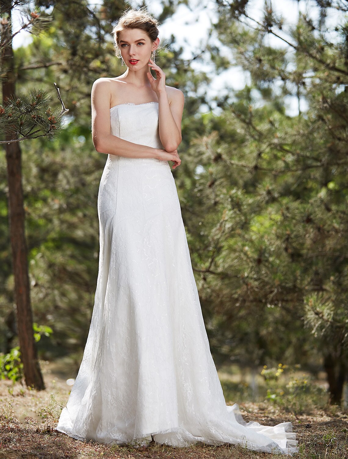 Elegant A-Line strapless satin wedding dress with lace appliques.