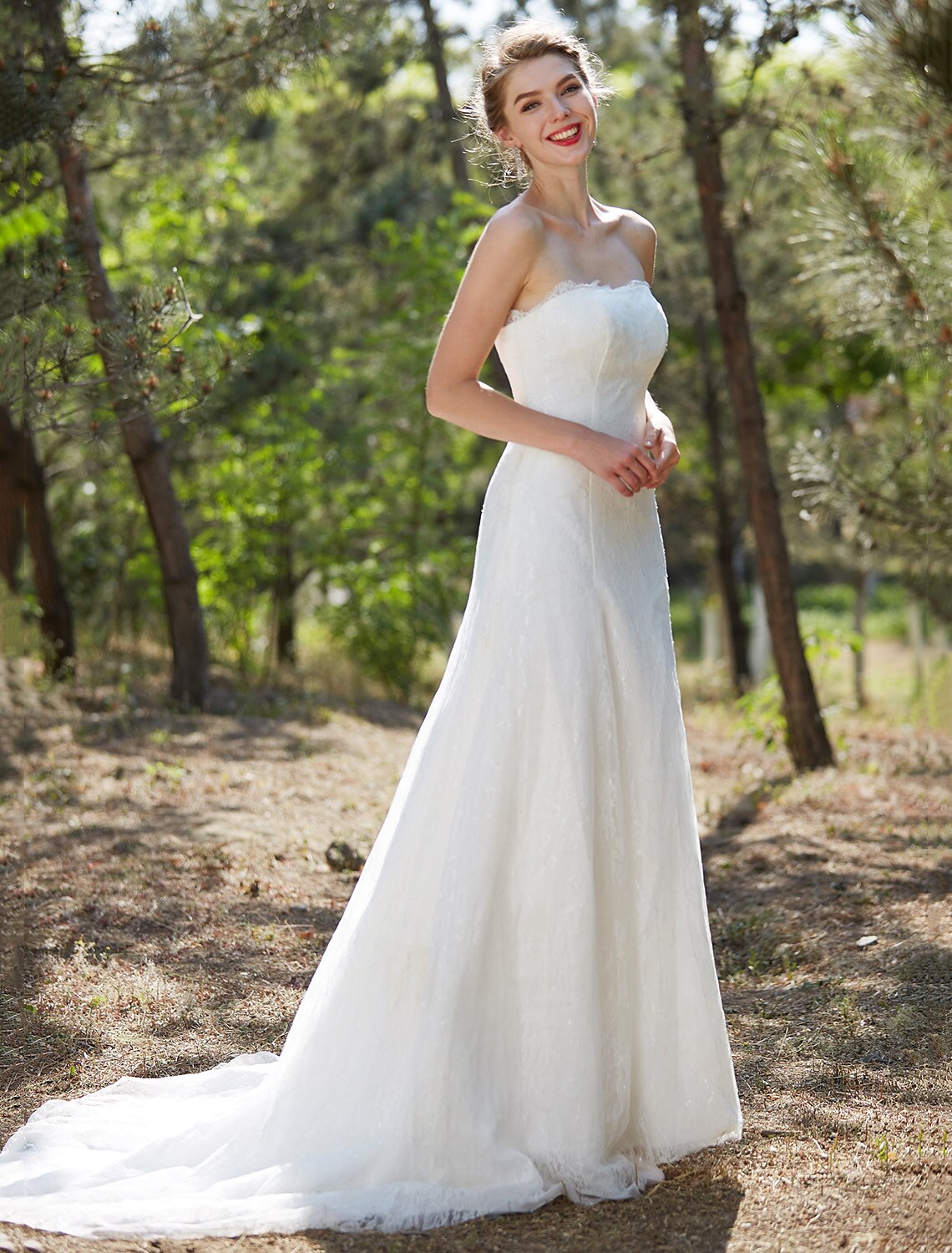A-Line wedding dress showcasing its elegant silhouette and court train.