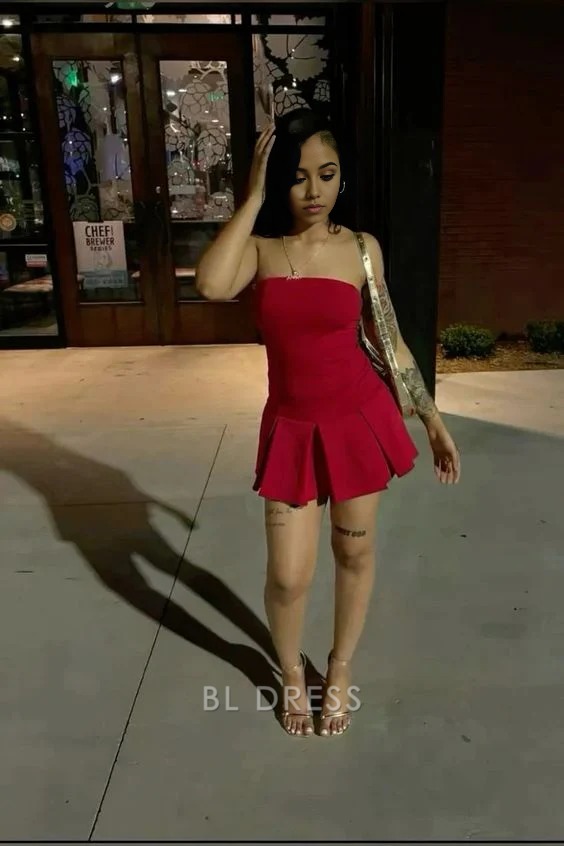 Red A-line strapless short dress with a fitted bodice and flowing skirt.