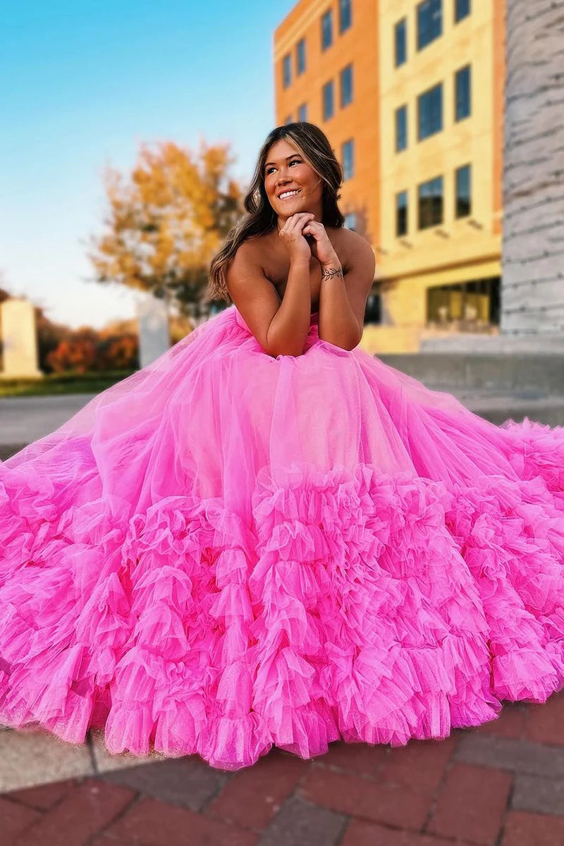 Elegant A-Line strapless sweetheart pink prom dress with floor-length tulle skirt.
