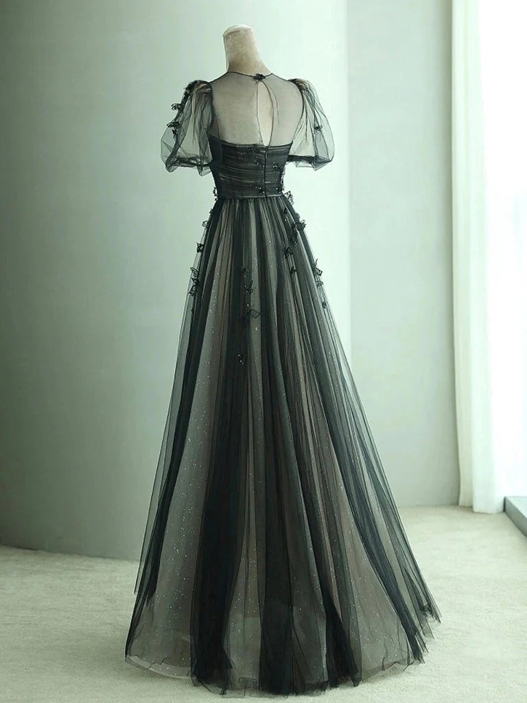 Long formal gown featuring delicate tulle and butterfly embellishments in light blue.