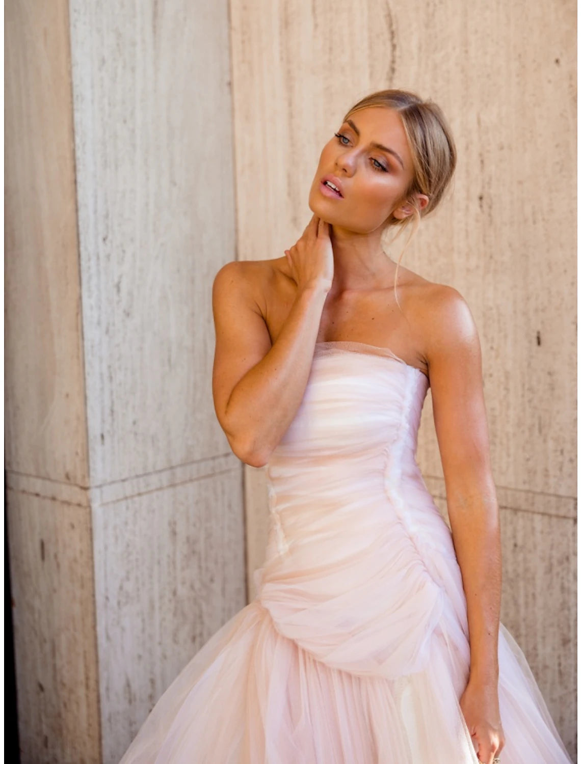 Side view of the formal A-line dress, highlighting its elegant silhouette.