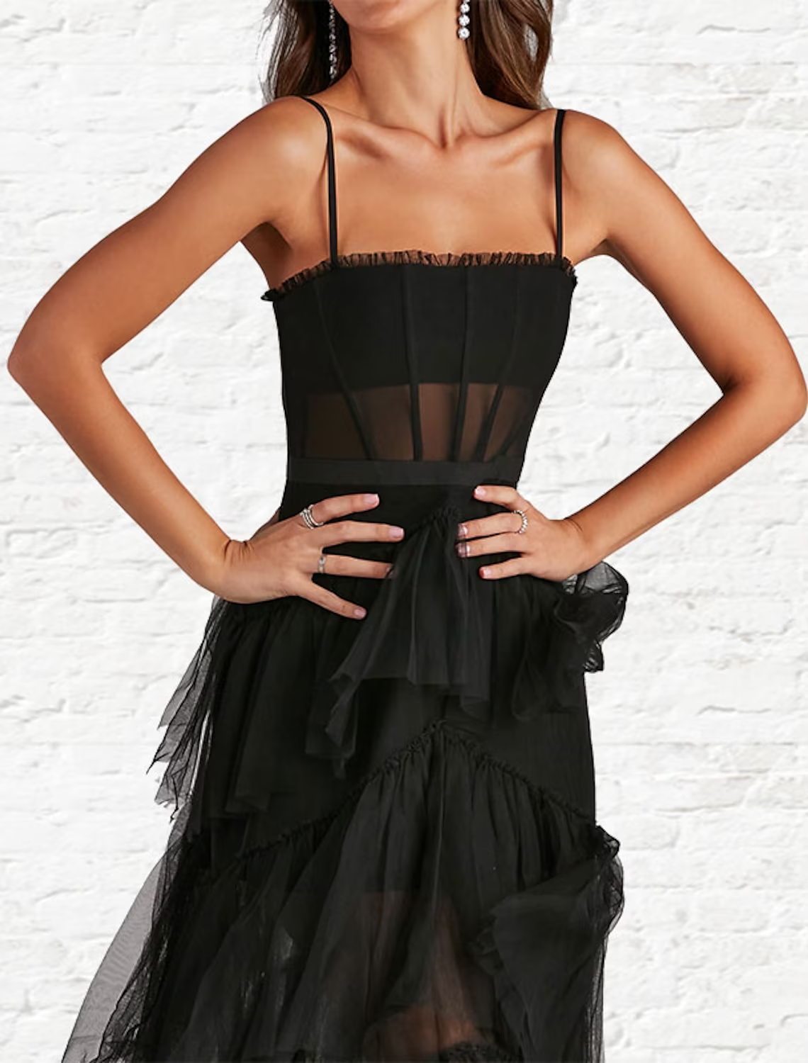 Back view of A-line strapless tulle prom dress with ladder back.