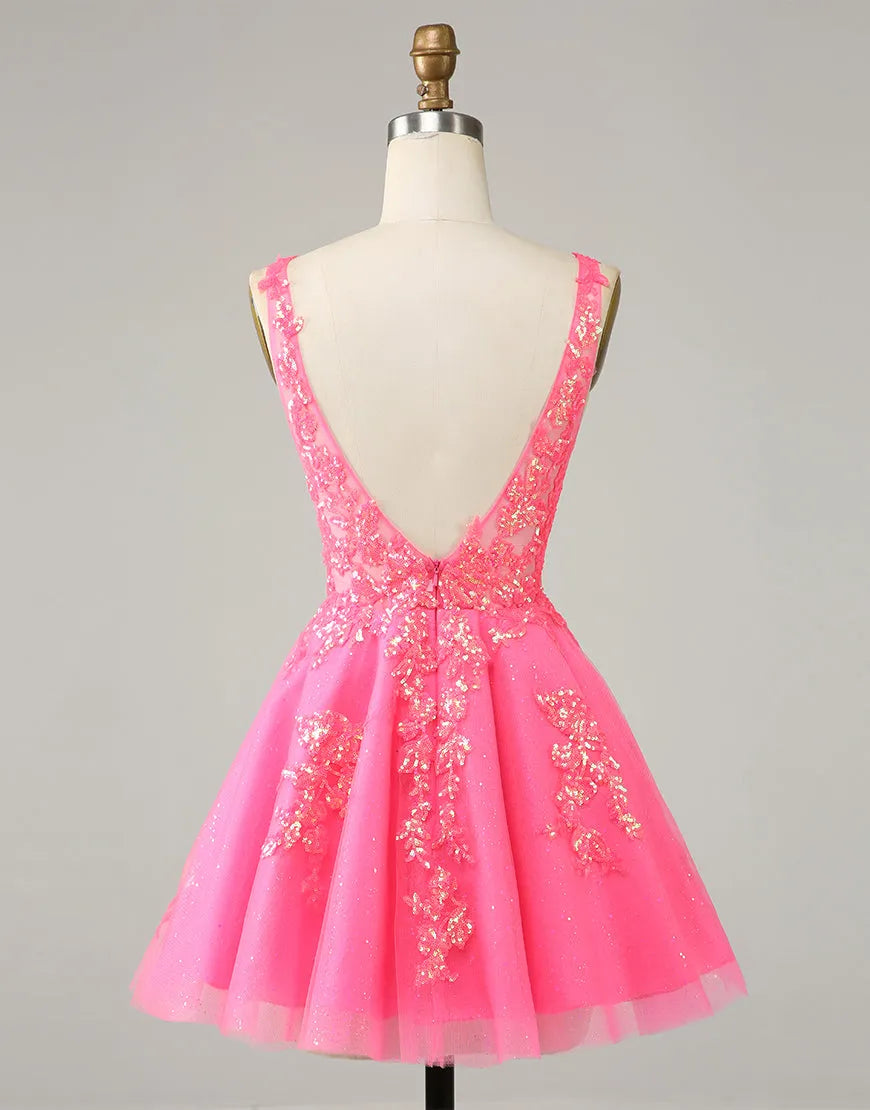Strapless A-line mini dress with intricate appliques.