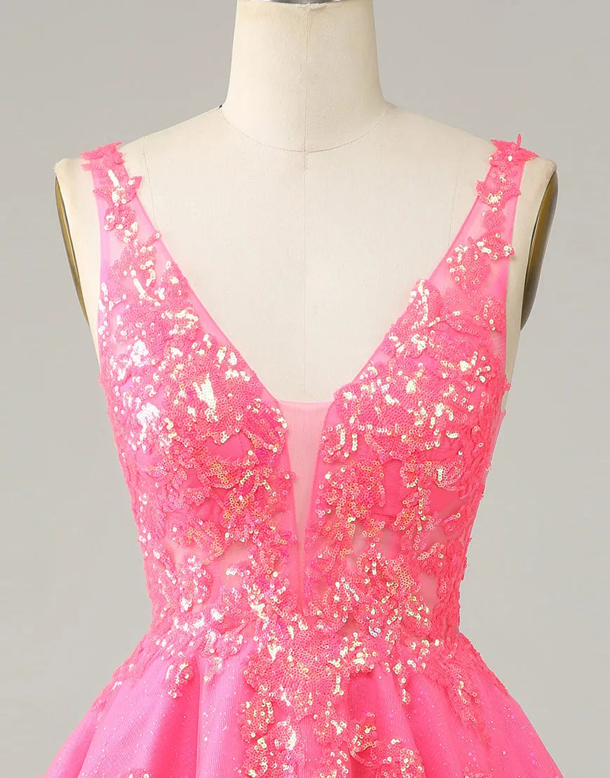 Back view of the short tulle homecoming dress with appliques.