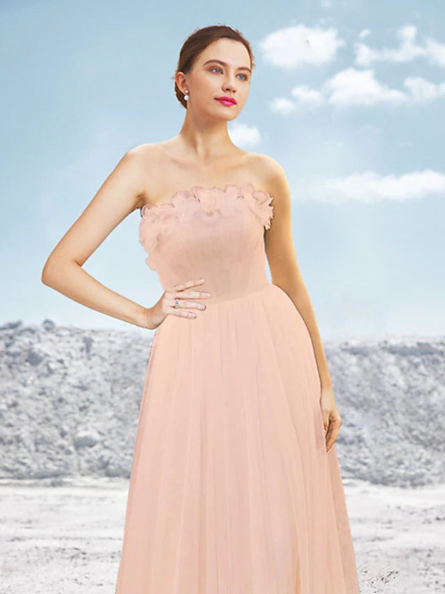 Back view of the formal A-line gown showcasing the sweep train.