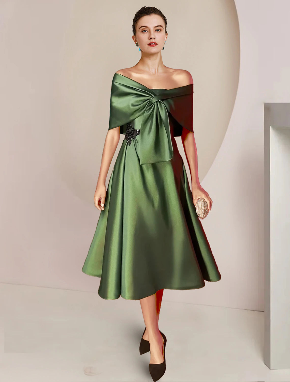 Elegant A-line strapless tea length dress with sequin details and matching shawl.