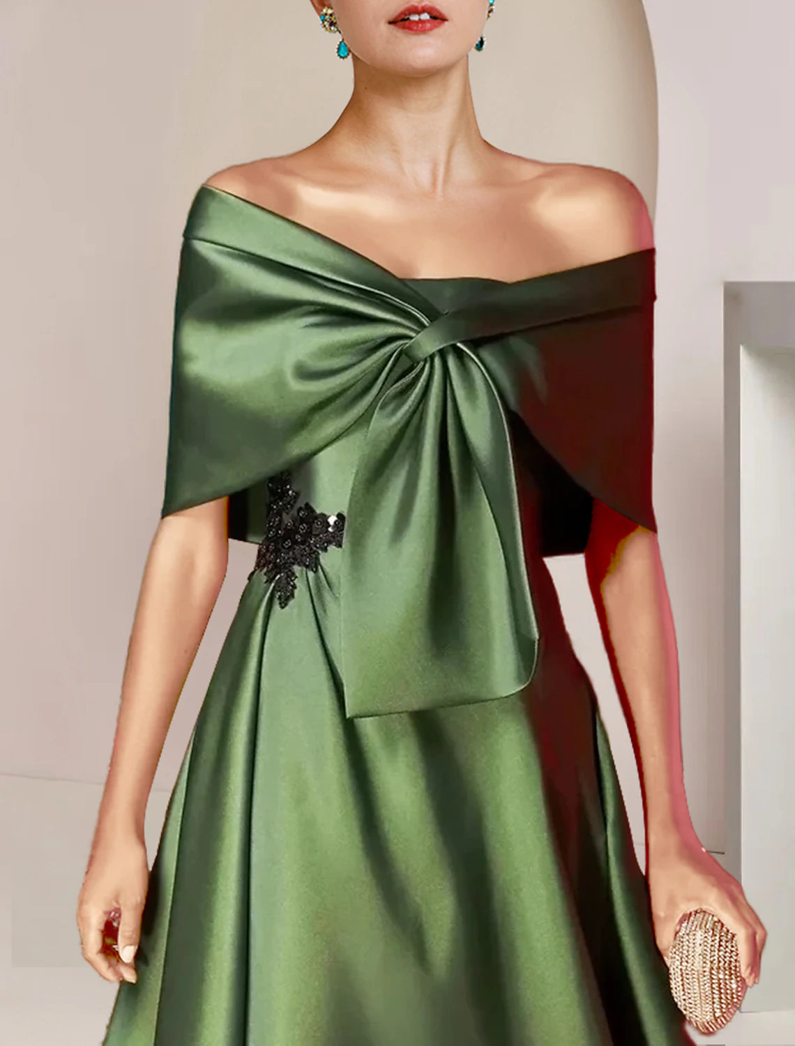 Back view of the A-line tea length formal dress.