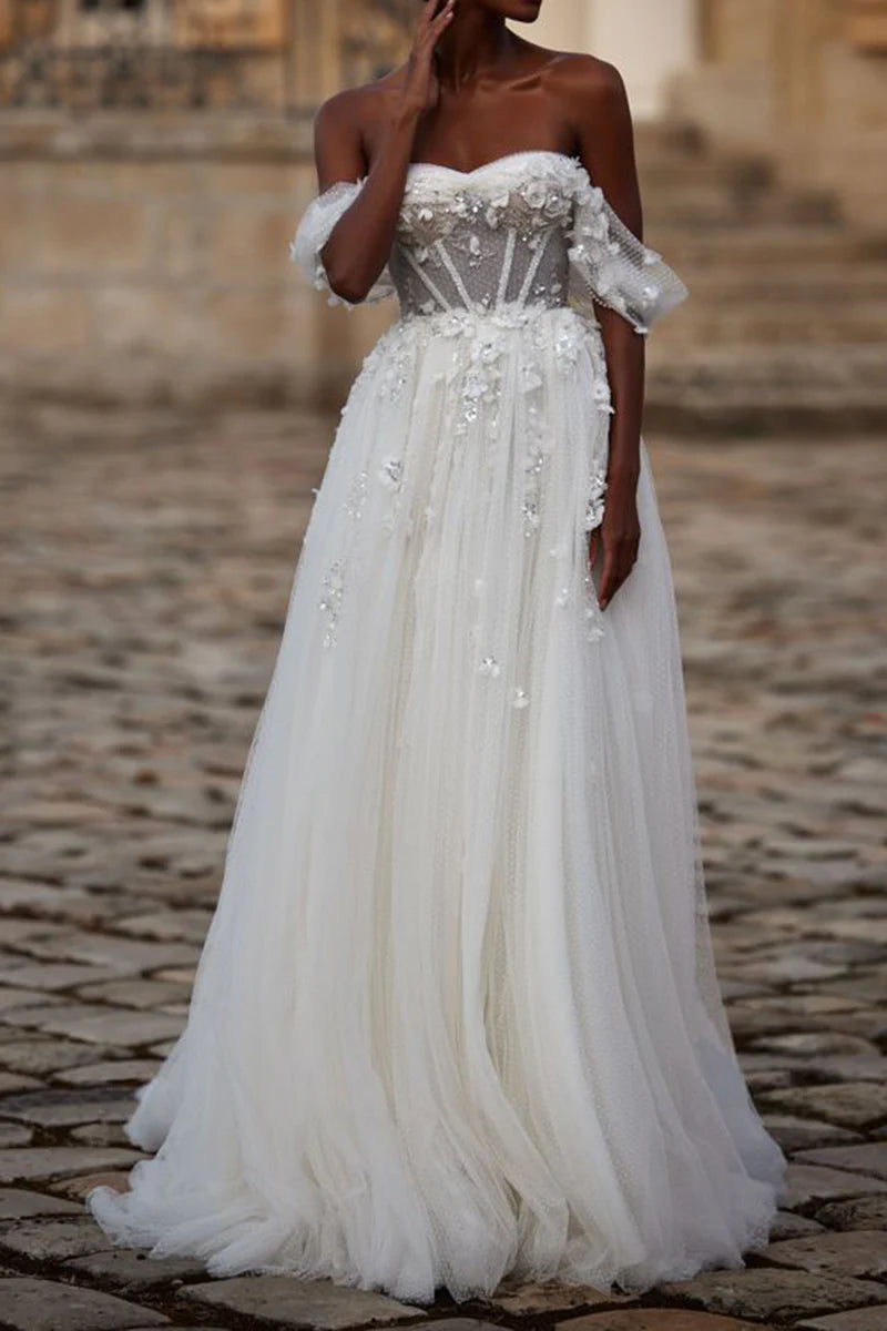 Elegant A-line wedding dress with sweetheart neckline and 3D appliques.