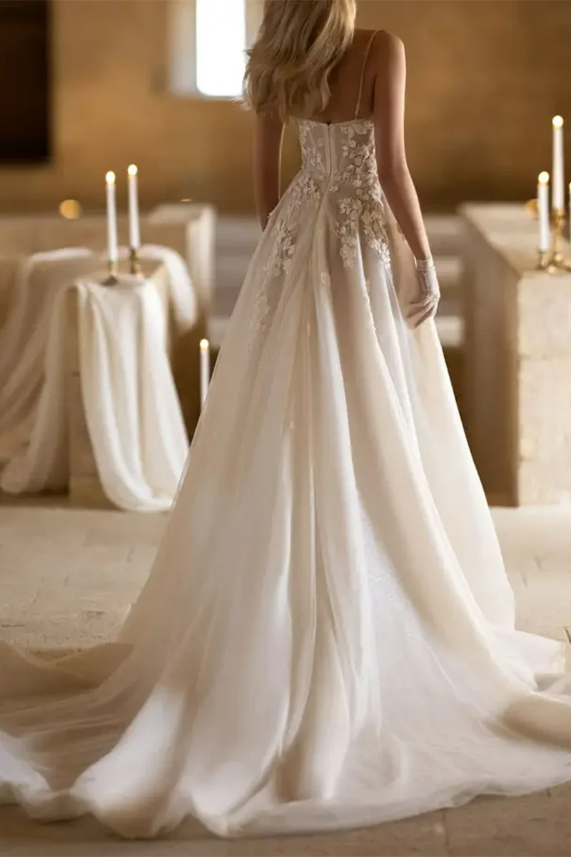 Back view of A-line bridal gown showcasing a graceful court train.