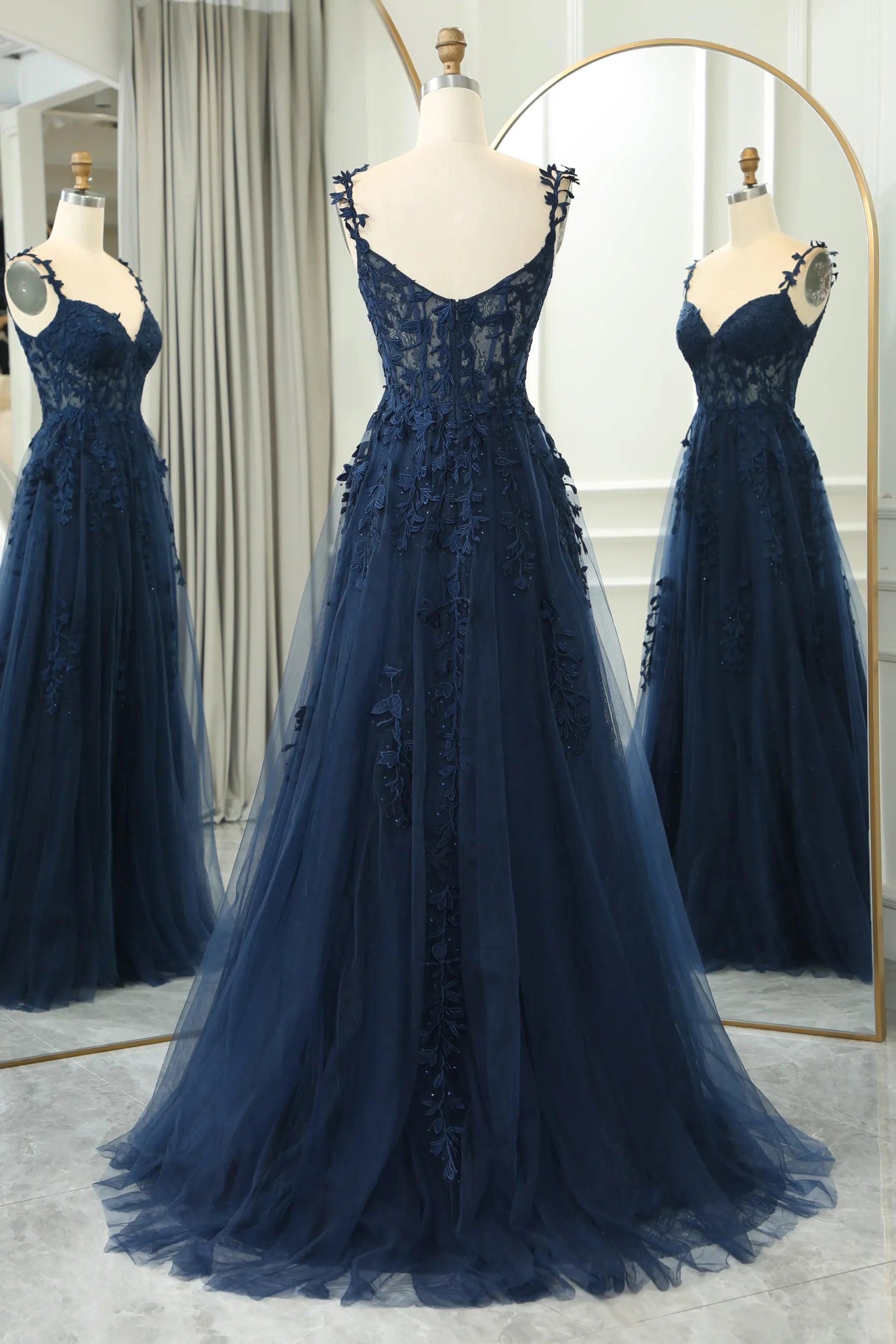 Side view of the flowing light blue A-line prom dress.