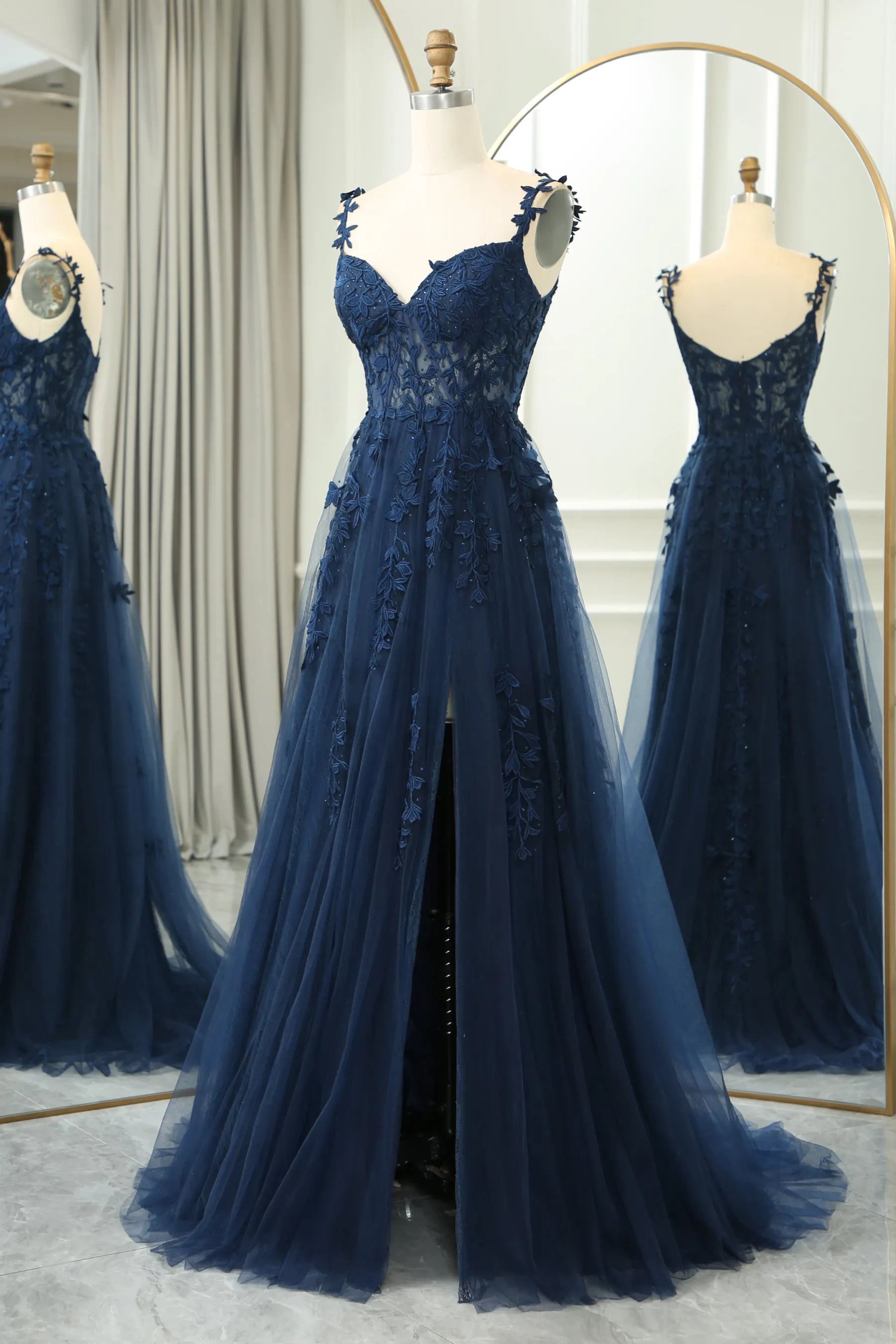 Back view of the light blue A-line prom dress, showcasing its design.