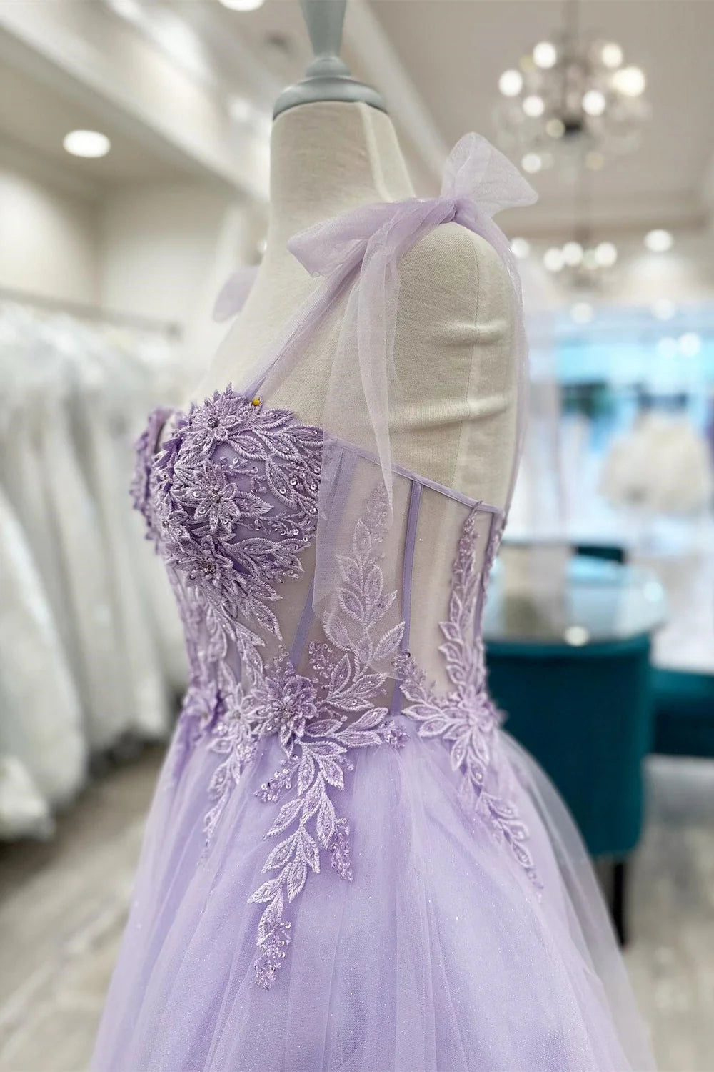 Back view of an A-line sweetheart short homecoming dress with appliques.