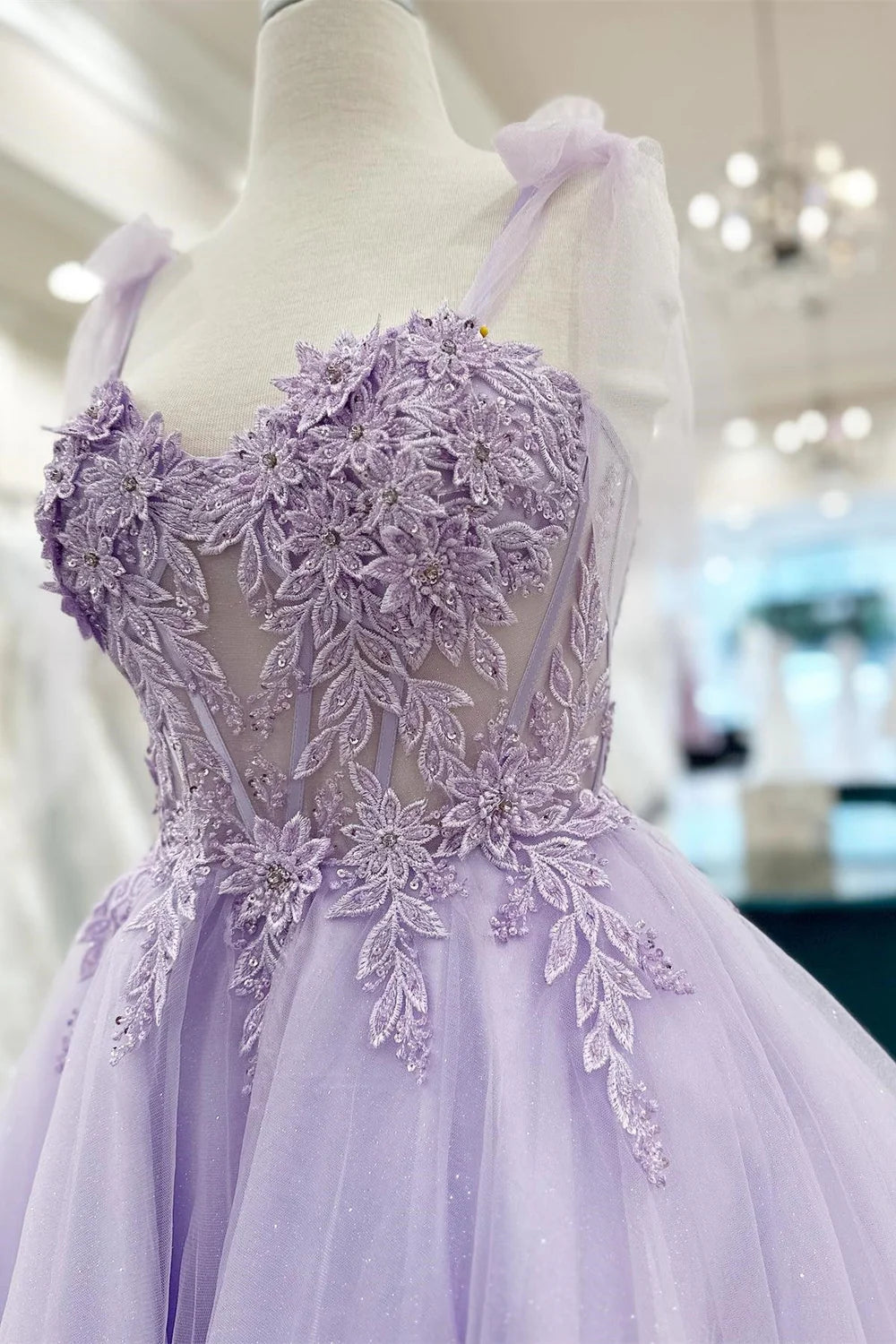 Elegant A-line short homecoming dress with sweetheart neckline and appliques.