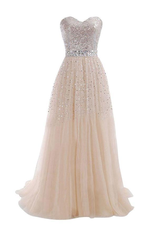 Elegant sweetheart neckline prom dress with intricate beading and sequins.