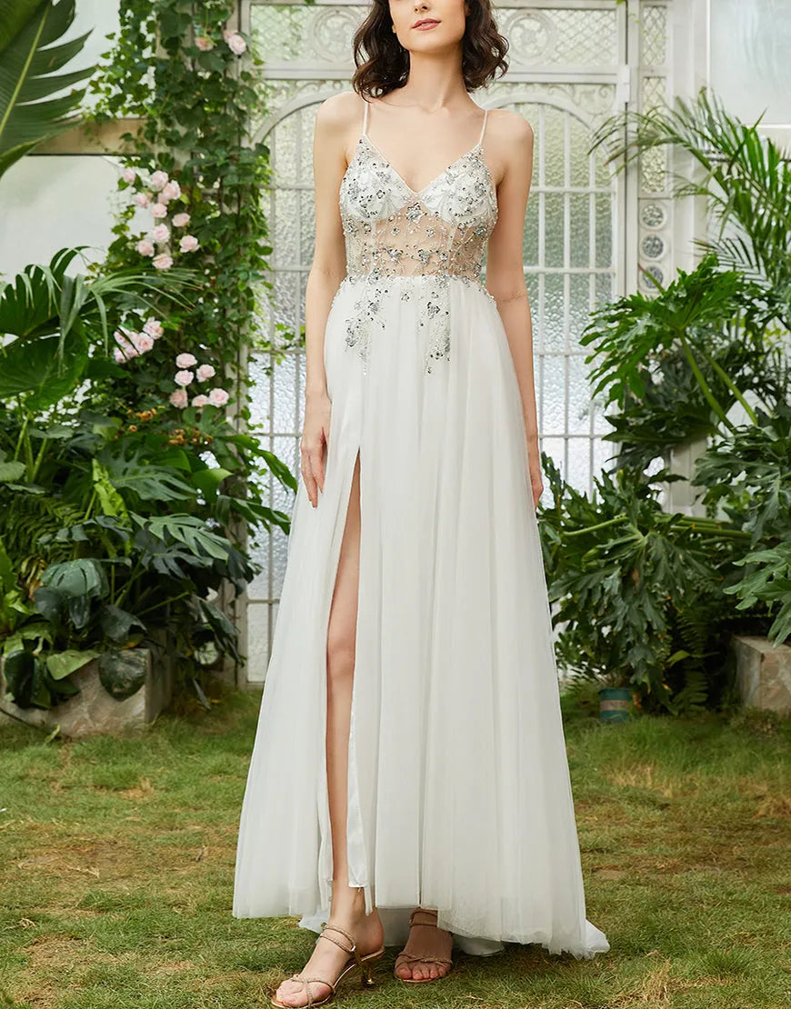 Side view of an elegant A-line long prom dress.