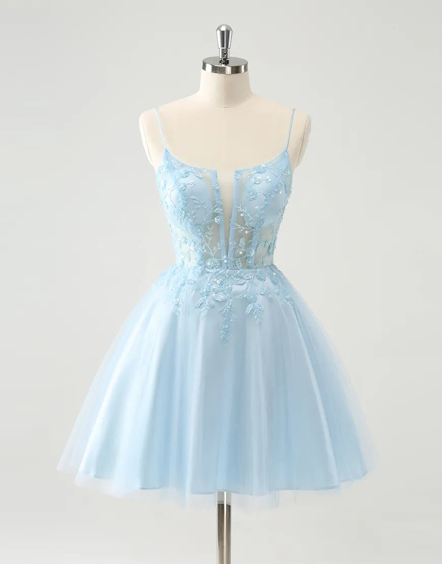 Full view of the blue A-line homecoming dress with beaded flowers and a corset bodice.