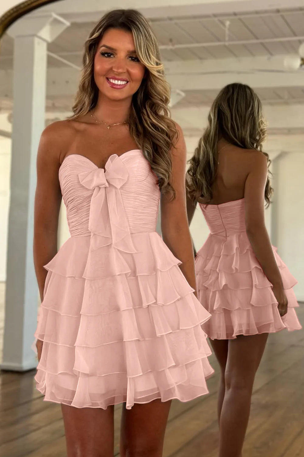Back view of the short chiffon dress, highlighting the tiered skirt.