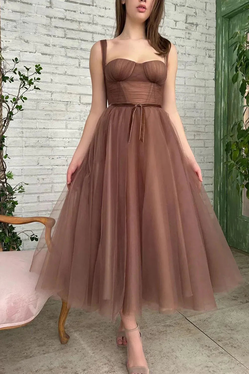 Elegant brown A-line dress with sweetheart neckline.