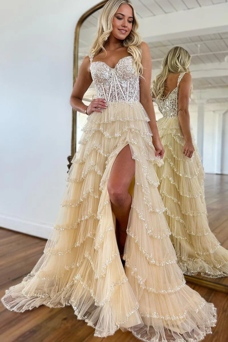Elegant A-Line champagne tulle prom dress with tiered skirt and beading.