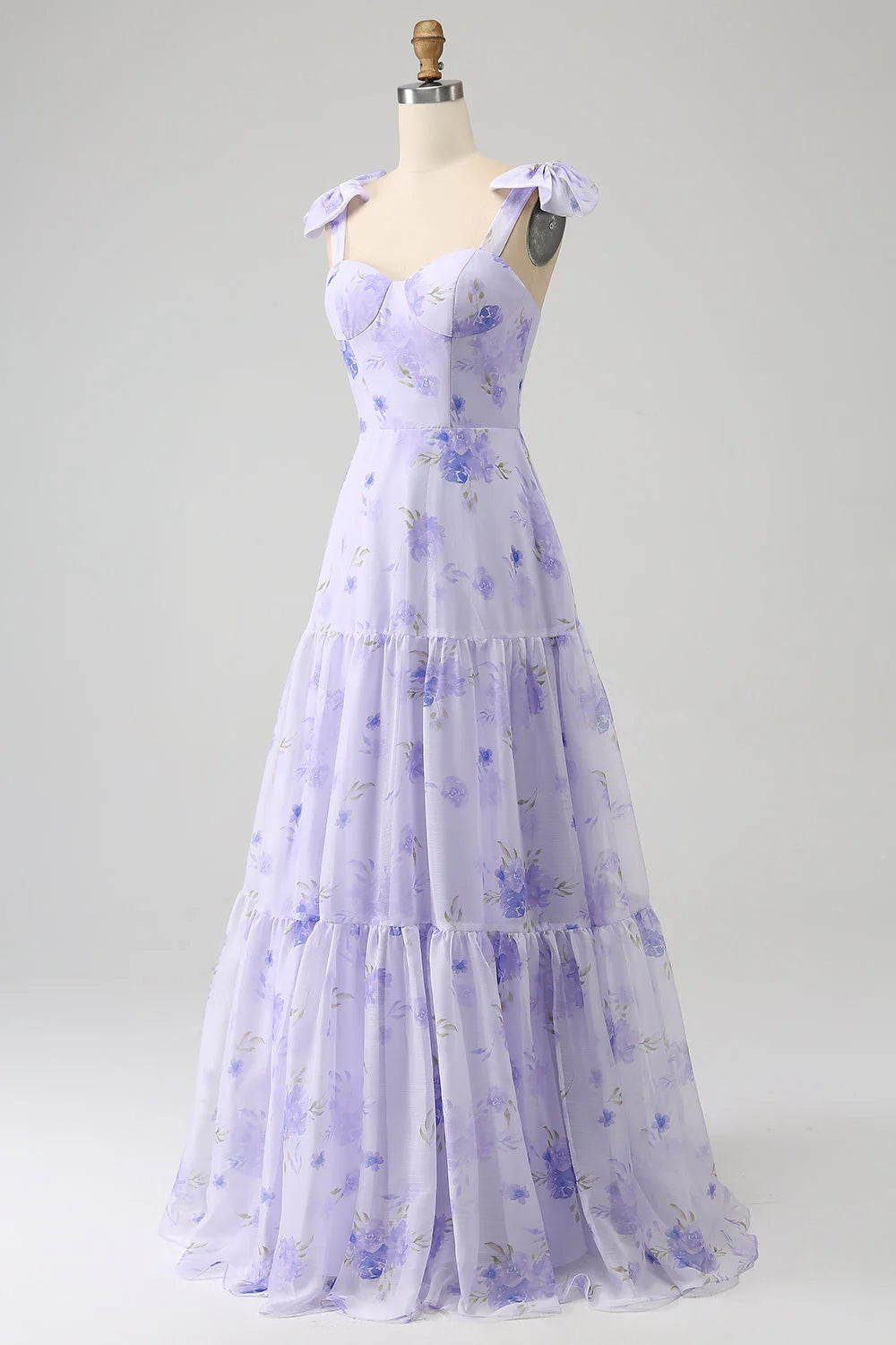 Side profile of the lilac A-line prom dress, highlighting the floral details on the bodice.