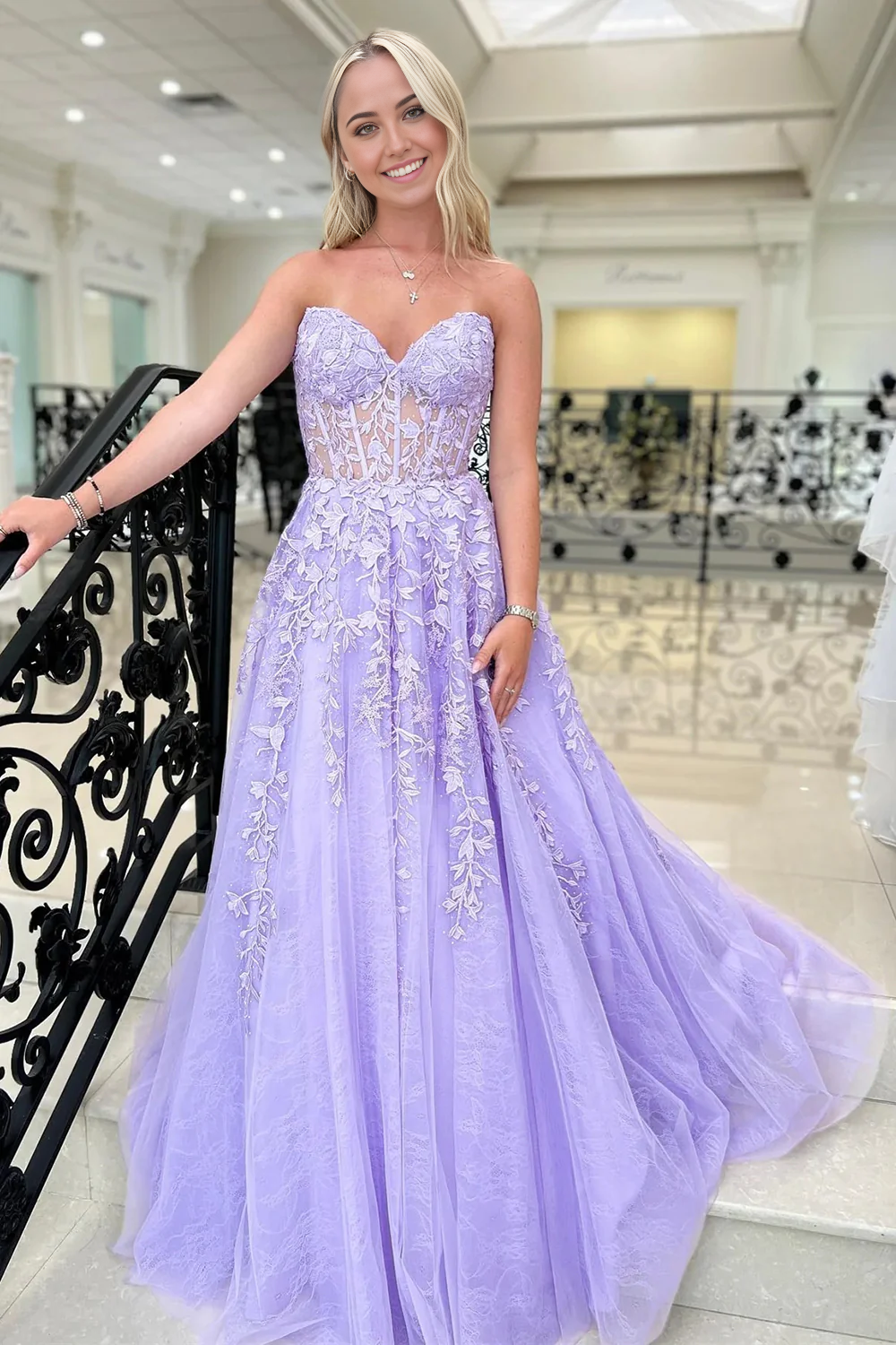 Back view of the A-Line Sweetheart Purple Corset Formal Dress, highlighting appliques.