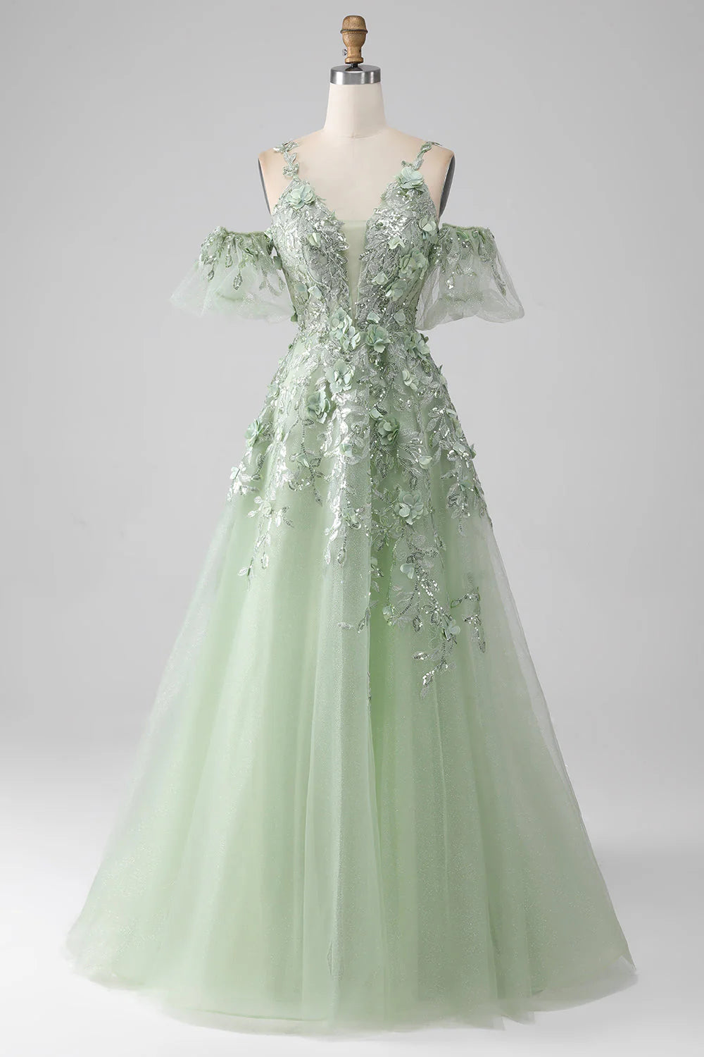 Close-up of the floral corset bodice on a sage A-line prom dress.