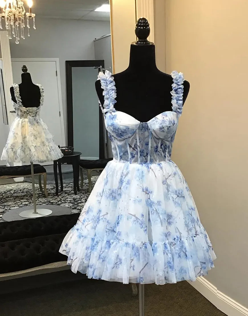 A-line floral homecoming dress with ruffled straps and corset bodice detail.